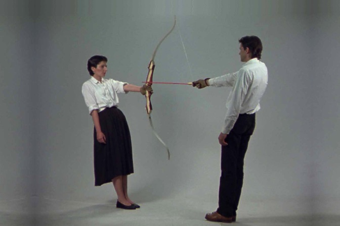 Rest Energy is a 1980 performance art piece created and performed by then-performance artist duo Marina Abramović and Ulay and recorded in Amsterdam. Courtesy the Pomeranz Collection an copyright the artists.