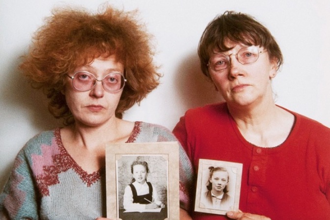 Rosy Martin and Jo Spence undertaking a phototherapy session using childhood portraits from their family albums. Copyright Jo Spence, courtesy Terry Dennett and Richard Saltoun Gallery, London