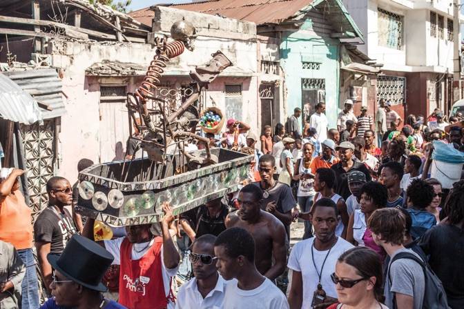 Procession with sculpture by Andre Eugene, 3rd Ghetto Biennale 2013 Photo: Lazaros